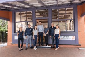 Rose Optometry team outside the practice in Berry NSW